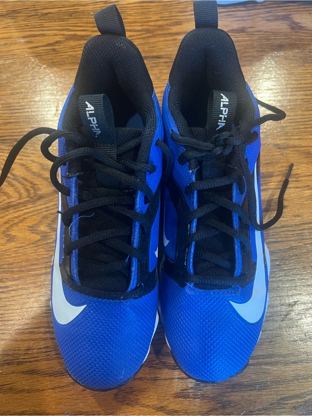 Nike Kids Blue and Black Football Cleats with White Swoosh